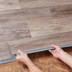 6 in. W Brushed Oak Taupe GripStrip Luxury Vinyl Plank Flooring (24 sq. ft./case) by TrafficMaster -TrafficMaster || Addison Rugs Sales brushed oak taupe trafficmaster vinyl plank flooring 95311 44 1000
