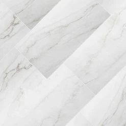 12 in. W x 24 in. L Calacatta Consilio Rigid Core Click Lock Luxury Vinyl Tile Flooring (66-case/1278.42 sq. ft./pallet) by TrafficMaster 11 12 in. W x 24 in. L Calacatta Consilio Rigid Core Click Lock Luxury Vinyl Tile Flooring (66-case/1278.42 sq. ft./pallet) by TrafficMaster -TrafficMaster || Addison Rugs Sales calacatta consilio trafficmaster vinyl tile vtrhdclconp 1f 1000