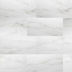 12 in. W x 24 in. L Calacatta Consilio Rigid Core Click Lock Luxury Vinyl Tile Flooring (66-case/1278.42 sq. ft./pallet) by TrafficMaster